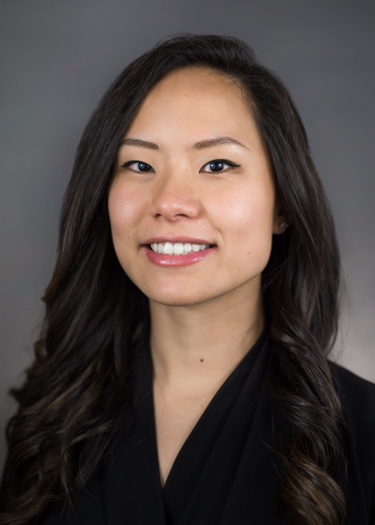 a woman smiling at the camera